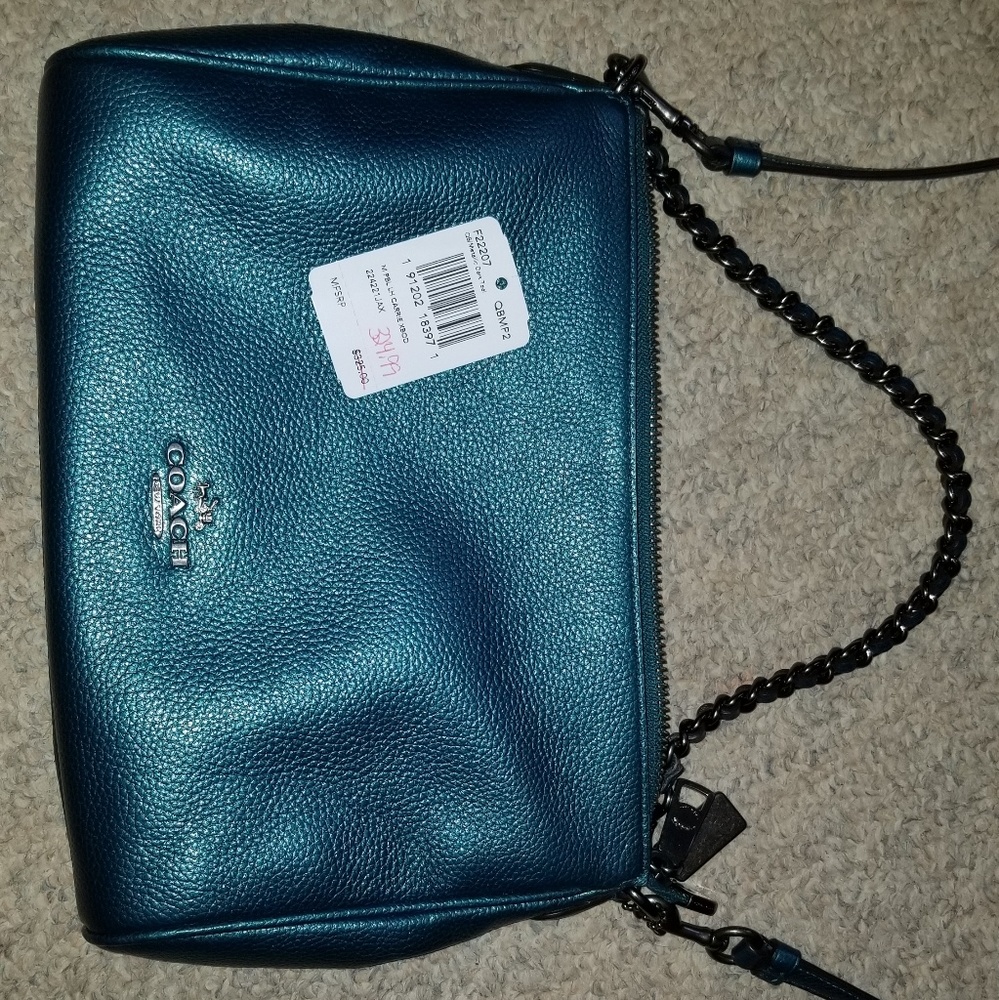 Coach leather pebble carrie